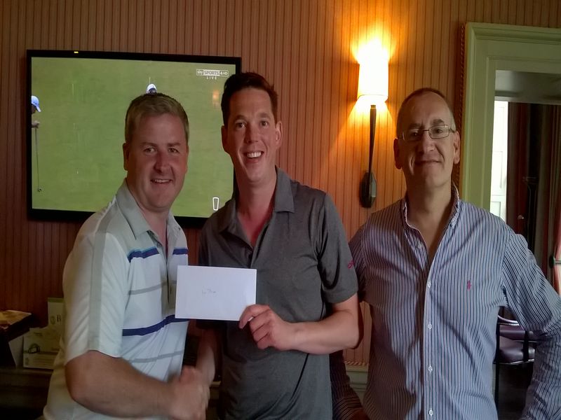 Druids Glen winner William Monaghan (centre). Event sponsor Brian Carroll presenting and Captain David Dolan.